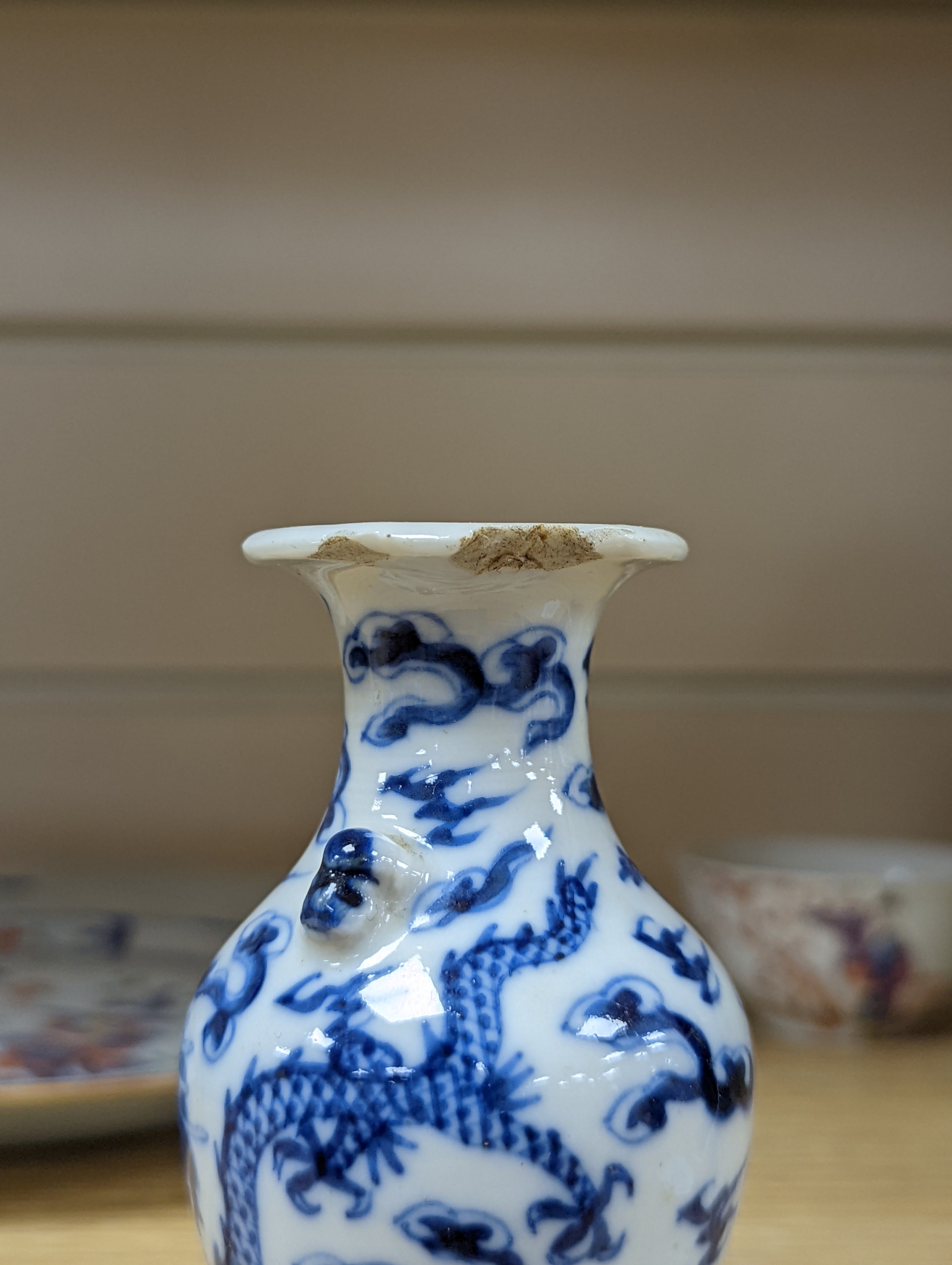 A collection of 19th and 20th century Chinese ceramics, tallest item jar and cover 15 cms high.